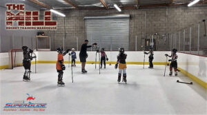 Super-Glide synthetic ice rink for hockey practicing and hockey training facility