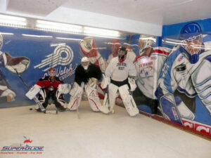 Goalie. Super-Glide synthetic ice rink for hockey practicing and hockey training